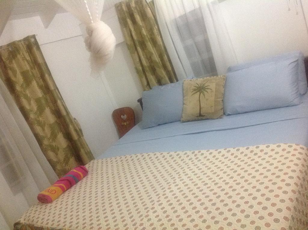 Rainbow Beach Apartments & Rooms Calibishie Pokoj fotografie